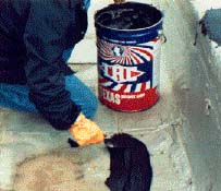 WINTER-PATCH PLASTIC CEMENT is a trowelable, asphalt-based, cold weather roof repair compound. It may be used with GLAS-WEB Roofing Mesh to add even greater strength and life to your roof repairs when weather, temperature and exposure time allows